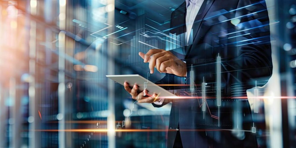 man-wearing-suit-is-utilizing-tablet-device-1024x452